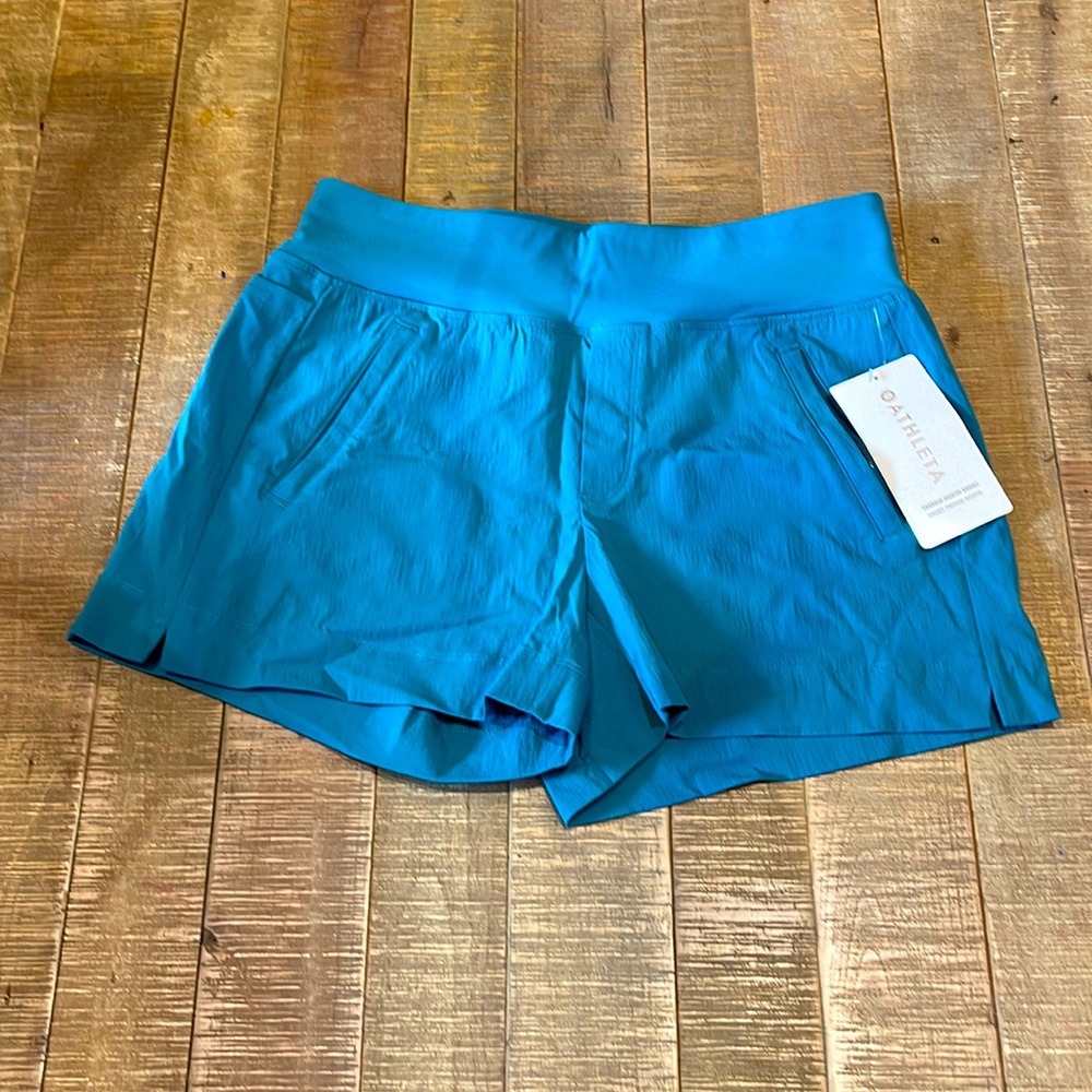 Blue Athleta shorts, new with tags. Women’s size 4.